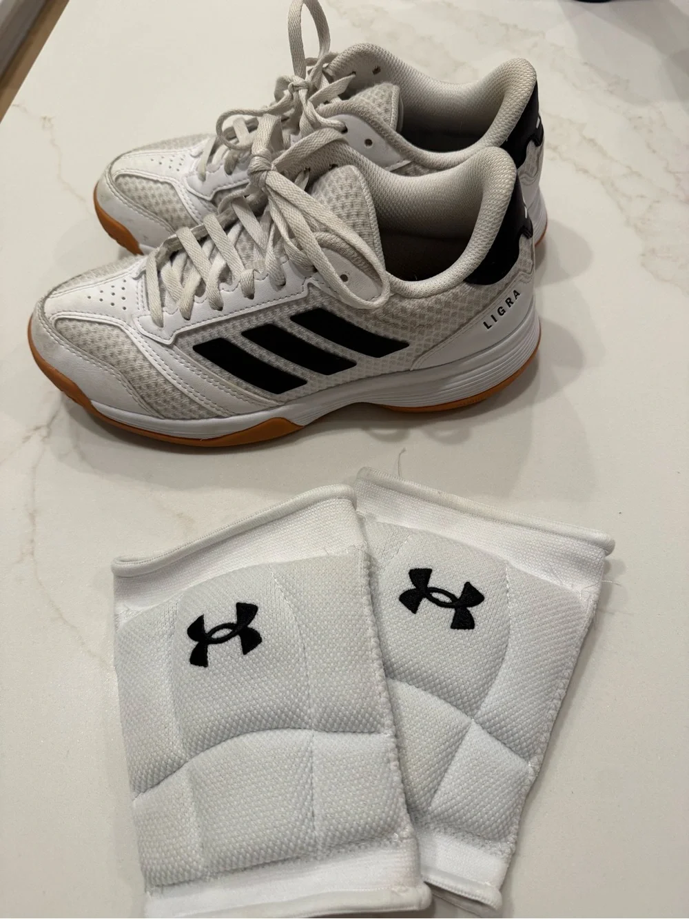 adidas White & Black volleyball shoes with under armor knee pads